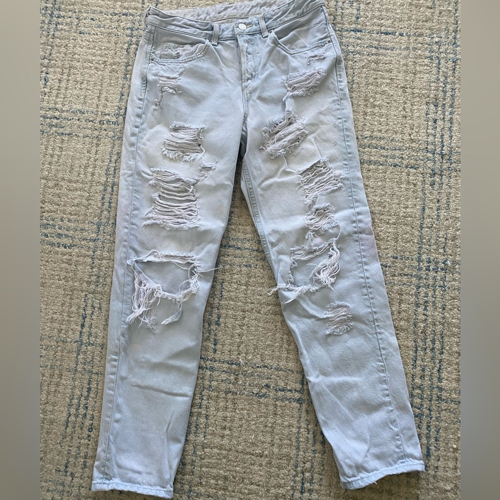 Light wash ripped boyfriend jeans